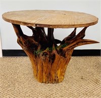 Natural tree base side table with a natural