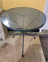 Metal patio table with a glass top - does have a