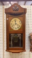 Vintage wall clock circa 1940s. Clockworks made
