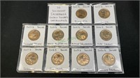 Coins - 10 different Sacajawea golden dollars,