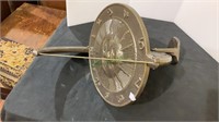 Cast metal sundial to be mounted to a base.