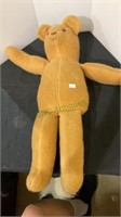 Naked teddy bear with no identifying tags.