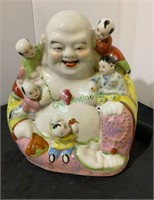 Beautiful hand-painted Buddha with happy family.