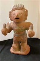 Handmade South America ceramic figurine holding