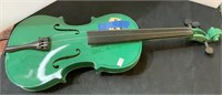 Child educator green violin - missing a couple