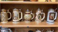 Shelf lot of decorative Steins made by Avon and