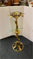 Gold colored art nouveau candle holder with