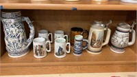 Shelf a lot of steins and mugs - four nice Norman