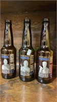Three collectible Coors beer bottles with Magic