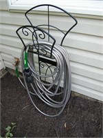 STAINLESS STEEL GARDEN HOSE w/ NOZZLE & CAST IRON