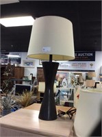 Singular brown lamp with linen shade