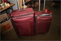 2 Suitcases on 4 Wheels,
