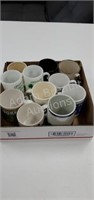 11 assorted coffee mugs