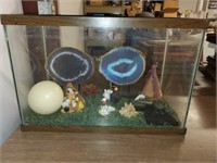 fish tank with collectibles
