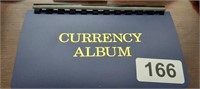 CURRENCY ALBUM WITH $5 BLUE SEAL, $5 RED SEAL, (5)