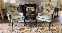 A Pair of Floral Appliqued Wing Back Chairs