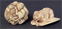 Two Carved Netsukes an Animal Sphere & Cat