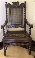Heavily Carved Caned Griffon Back Arm Chair