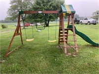 Child’s play set with swings and slide