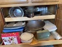 Contents of cabinet, wok, cookie cutters, bowls