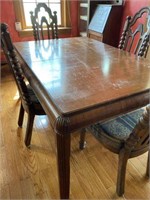 Waterfall dining table with four chairs
