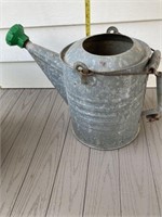 Galvanized bucket and galvanized watering can