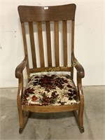 Rocking chair with floral cushion