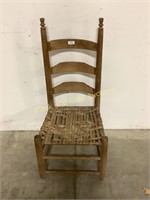 Wooden chair with wicker seat