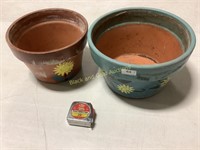 Pair of hand painted clay pots, 1-10in. , 1-12 in.