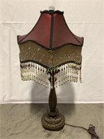 Victorian style table lamp with beaded shade