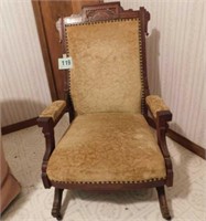 Antique walnut upholstered rocking chair w/ high