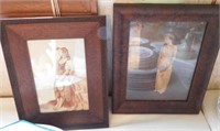 2 dark framed prints of ladies