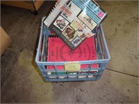 Crate of books for embrodery system