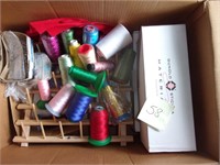 Box of thread, wooden spool holder, misc items