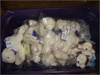 Tub of new stuffed lambs and puppie