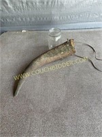 Antique cow horn with leather strap