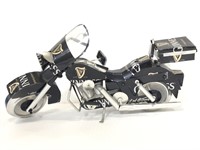 Repurposed Guinnes beer can model motorcycle