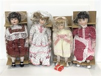 Four new assorted porcelain dolls w/ doll stand