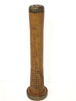 Antique wooden and brass candlestick holder