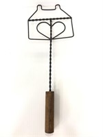 Metal and wooden vintage rug beater