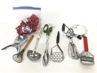 Eight vintage kitchen utensils plus cookie cutters