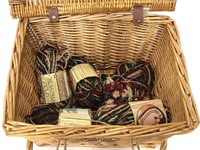 Wicker picnic basket of Christmas yarn