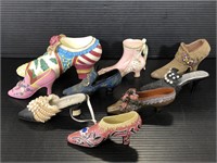 Collection of nine shoe figurines