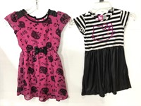 Two children’s extra small Hello Kitty dresses