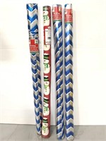 Four rolls of gift wrapping paper