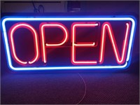 Large electric open sign.