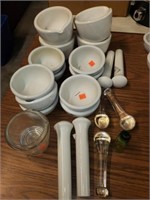 large lot of mortar and pestle