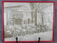 Framed historic motorcycle pictures