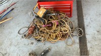 Pile of Assorted Extension Cords and Work Lights