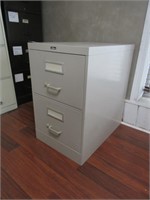 A Two Drawer Metal Legal Size Filing Cabinet